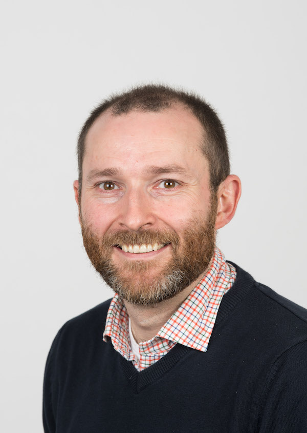 headshot of Dr. Timothy Duguid